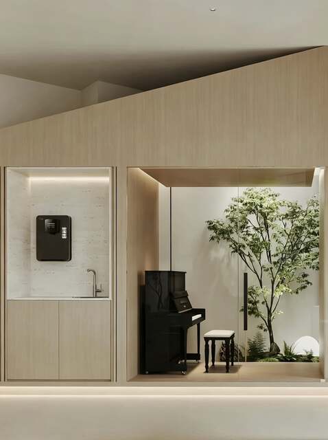 Upright piano beside a glass wall looking onto a small indoor garden
