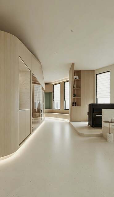 Studio hallway opening onto a piano lounge with a city view